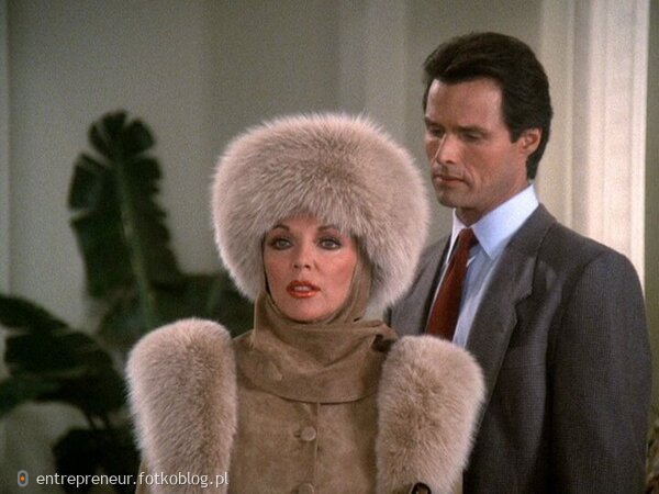 Joan Collins as Alexis and Dex