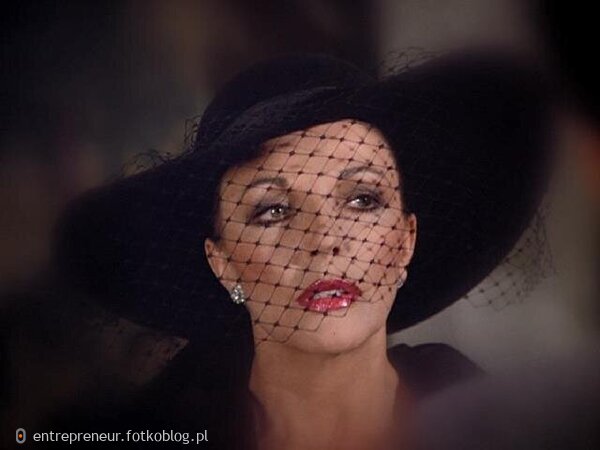 Joan Collins as Alexis 26